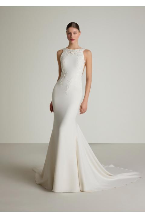 Abito da sposa DEVOTA bianco con dettagli in pizzo floreale, linea a sirena, elegante e raffinato.