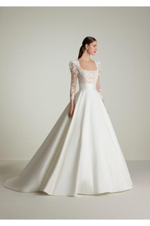 Abito da sposa SERENADA con corpetto in pizzo e maniche lunghe, gonna ampia in raso.