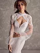 Abito da sposa Maggie Sottero IRAVATI con dettagli in pizzo e maniche trasparenti, stile elegante e moderno.
