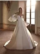 Abito da sposa MAHI elegante con maniche a campana in ambiente vintage.