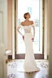 Abito da sposa ONYX di Mark Loren con corpetto in pizzo e maniche lunghe, elegante e sofisticato.