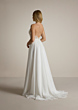 Abito da sposa THESEUS con schiena scoperta e dettagli in pizzo, vista laterale.