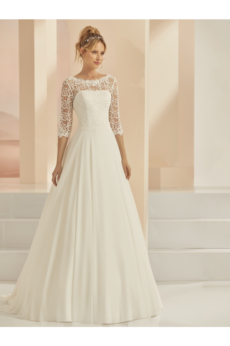 Abito da sposa CECILE LINEA BIANCO EVENTO, corpetto in pizzo, maniche a tre quarti, gonna ampia, elegante.