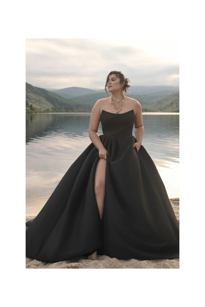 Abito da sera nero Maggie Sottero Aspen Black, scollatura a cuore, in riva al lago al tramonto.