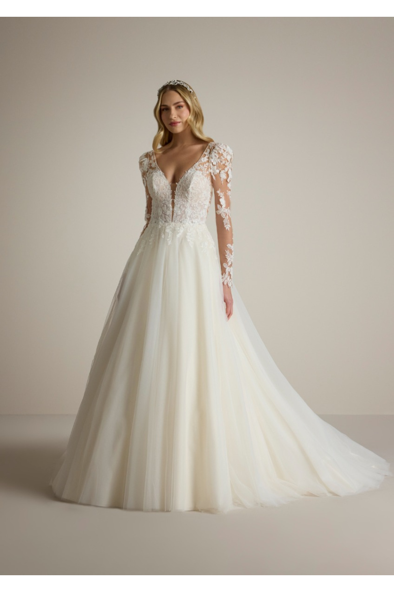 Abito da sposa DROOM con pizzo floreale e maniche lunghe trasparenti, stile elegante e romantico.