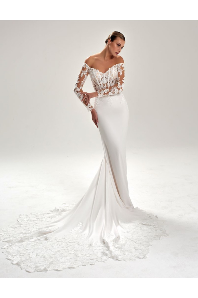 Abito da sposa LOLITE SPOSA CAPRI con pizzo floreale e maniche trasparenti, modello elegante e moderno.