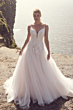 Abito da sposa Cassidy di Maggie Sottero in pizzo e tulle su scogliera, vista mare.