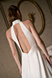 Abito da sposa bianco con schiena scoperta, collezione Malika - The Romantica Collection.
